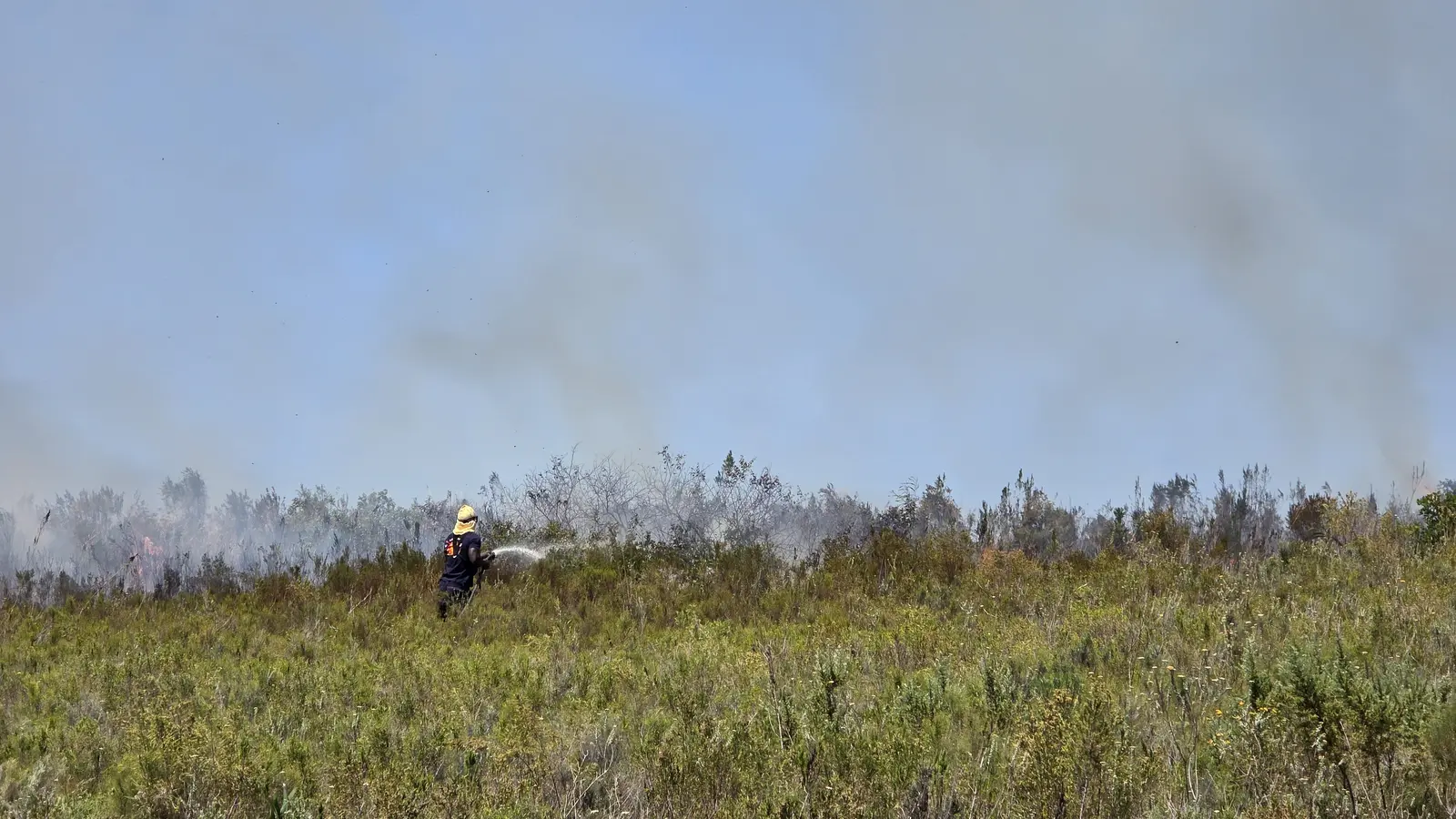 GVF volunteer firefighter working on the fire line